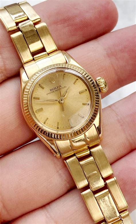 antique gold rolex ladies watch.